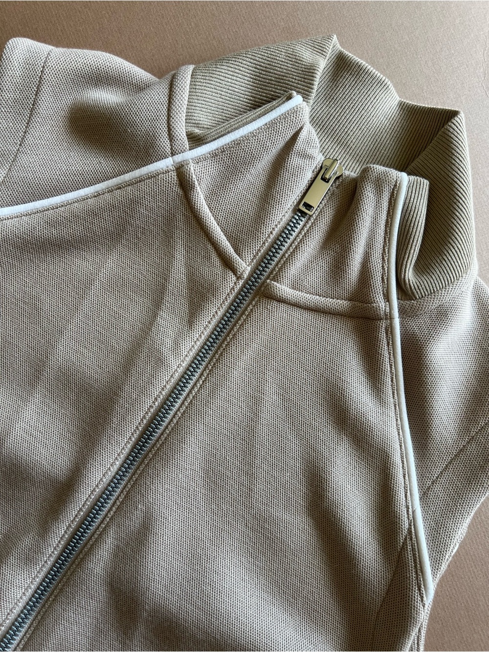 SPANX AirEssentials Pique
Sleeveless Mockneck Jumpsuit in Beige Ashwood - Picture 7 of 9